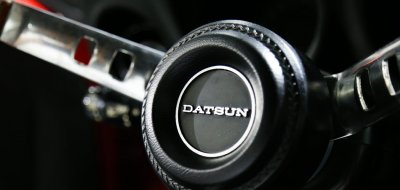 Datsun 240Z steering wheel closeup