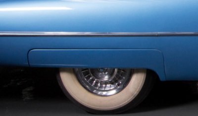 Cadillac De Ville 1959 rear wheel closeup view